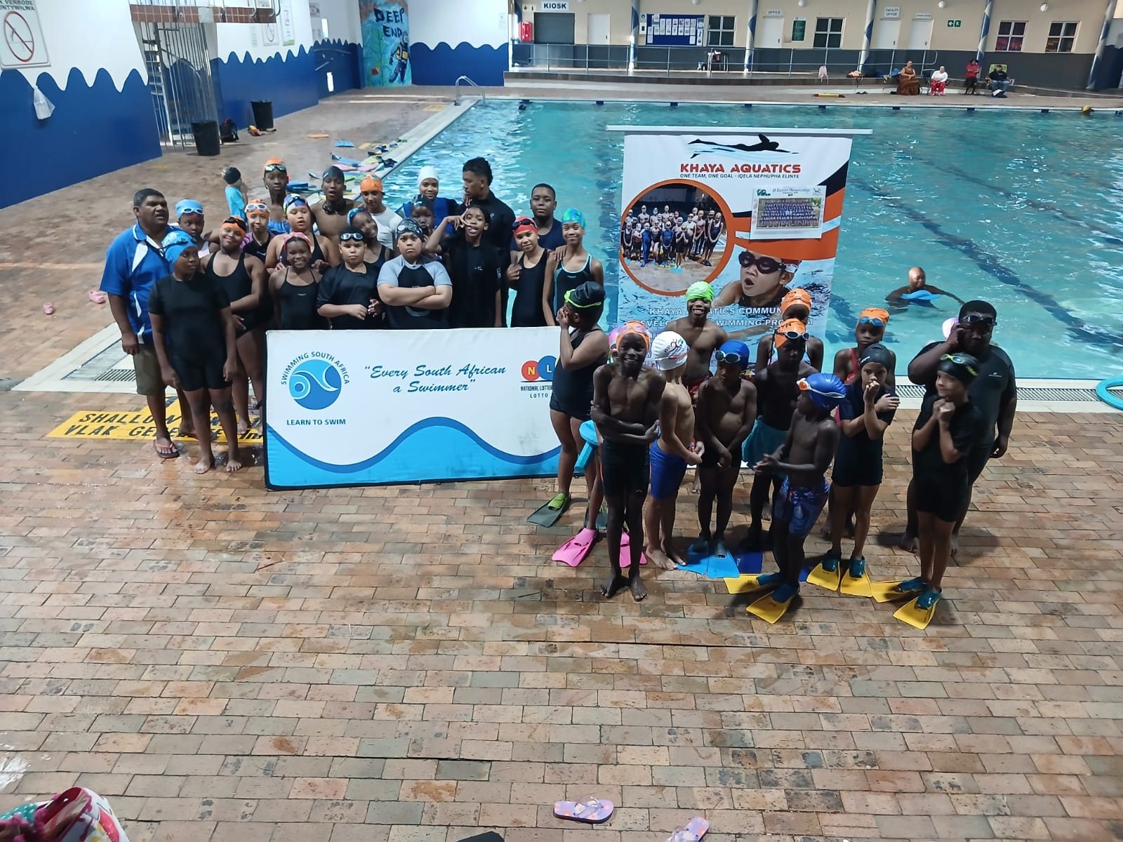 Coach and swimmer achievement photo