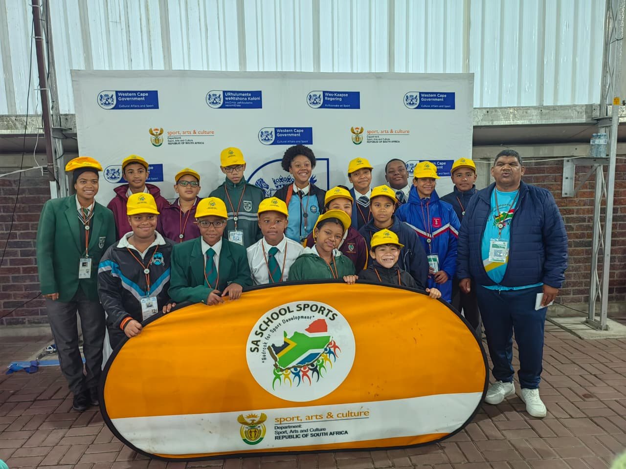 School sports team with banner