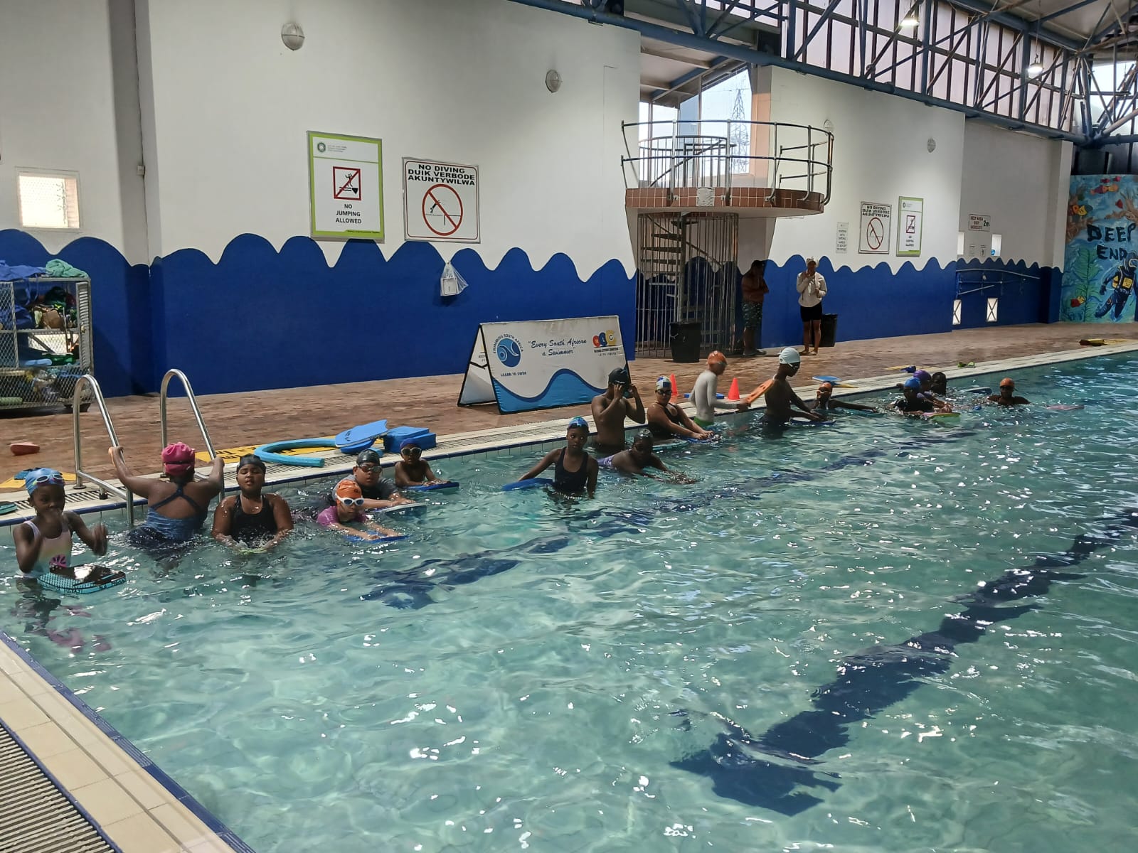 Khaya Aquatics swimmers training together in the heated pool